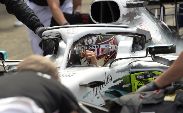 Hockenheim - Pit crew work on the car of Mercedes driver Lewis Hamilton