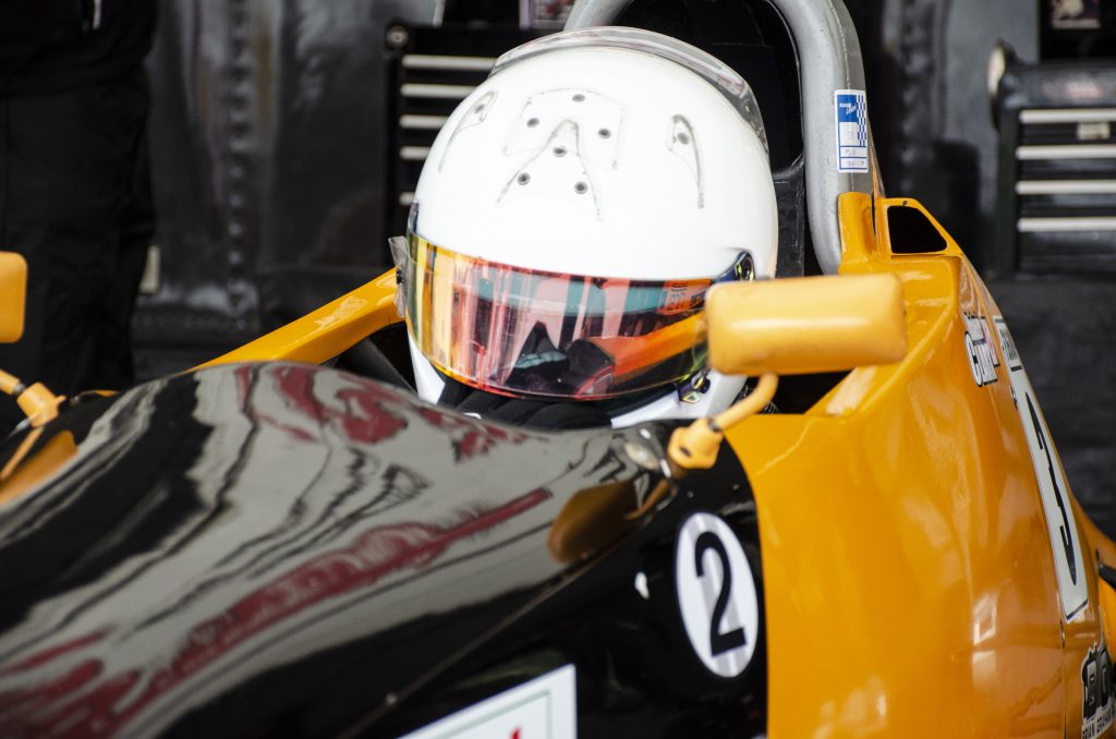 Mac Clark in his race car